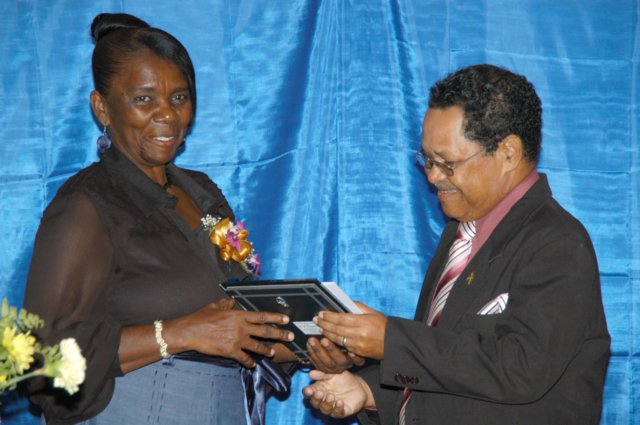 missjoycelyntullochreceivingaspecialawardforthirtyyearsservicetothenationallibraryofjamaica.jpg