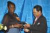 missjoycelyntullochreceivingaspecialawardforthirtyyearsservicetothenationallibraryofjamaica_small.jpg