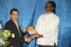 mrkevinobrienchangbeingpresentedwithagiftfromthenationallibraryofjamaica_small.jpg